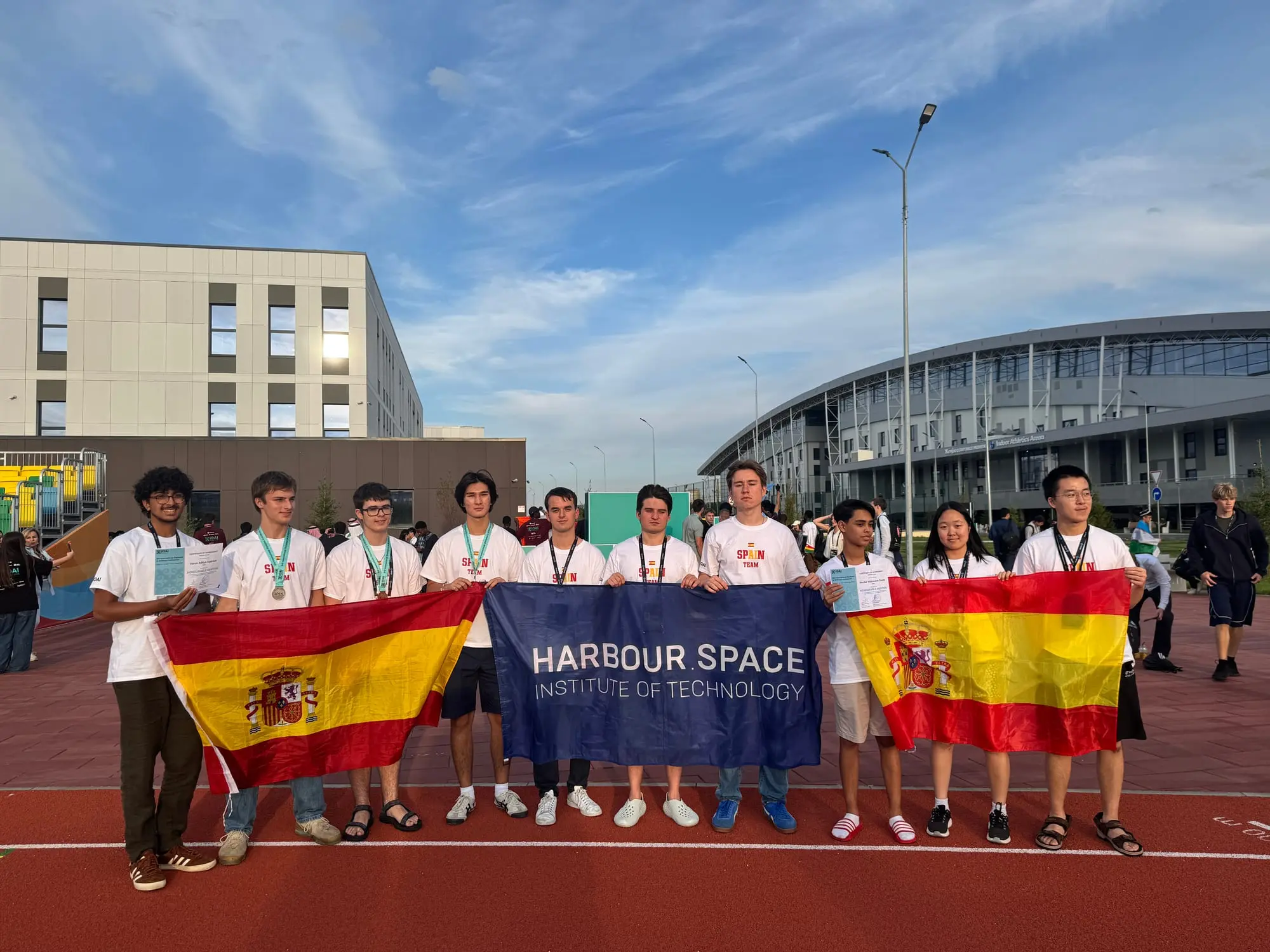 The Spanish delegation with the Harbour.Space banner.
